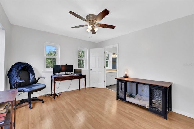 office area featuring light wood-type flooring and ceiling fan