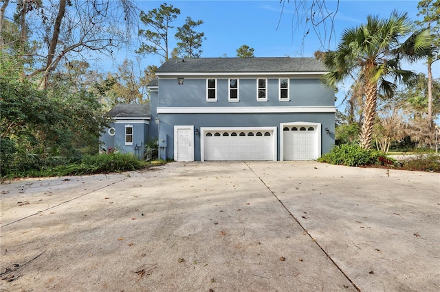 view of property featuring a garage