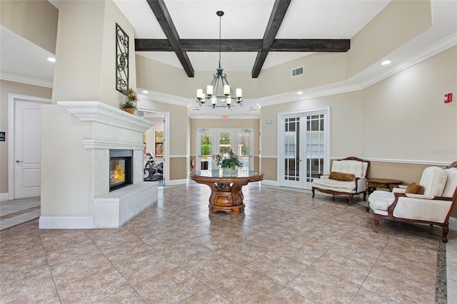 interior space featuring a high ceiling, coffered ceiling, an inviting chandelier, french doors, and beam ceiling