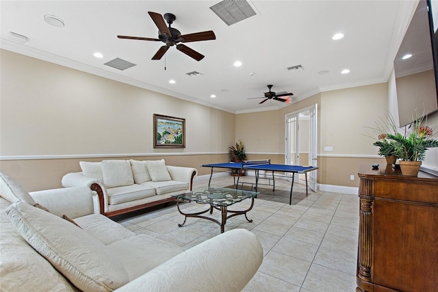 tiled living room with crown molding and ceiling fan