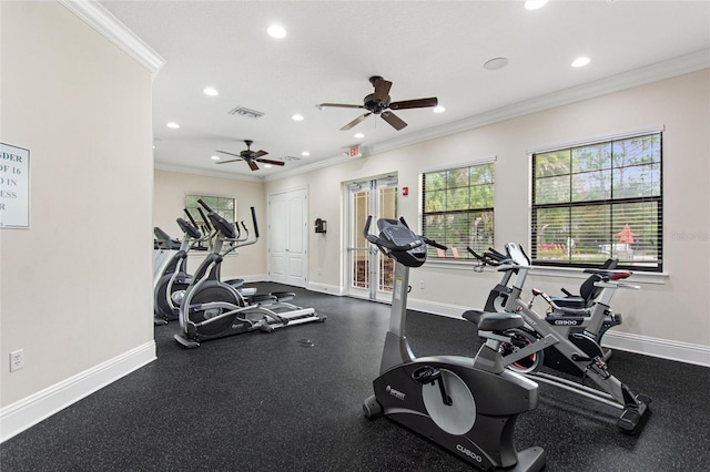 workout area featuring ceiling fan and ornamental molding