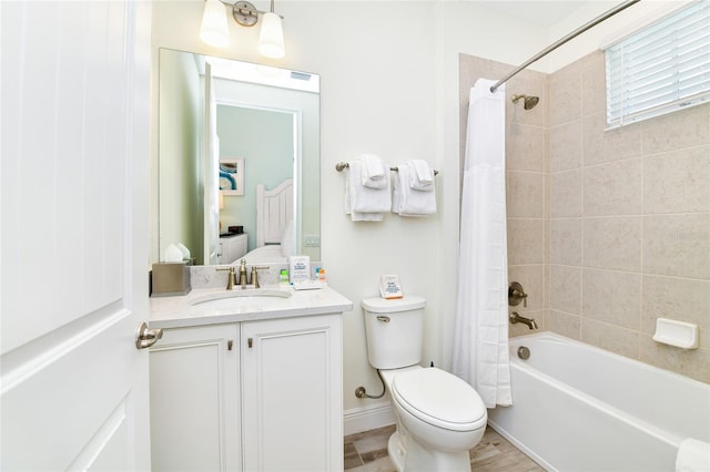 full bathroom featuring shower / bath combination with curtain, vanity, toilet, and hardwood / wood-style floors