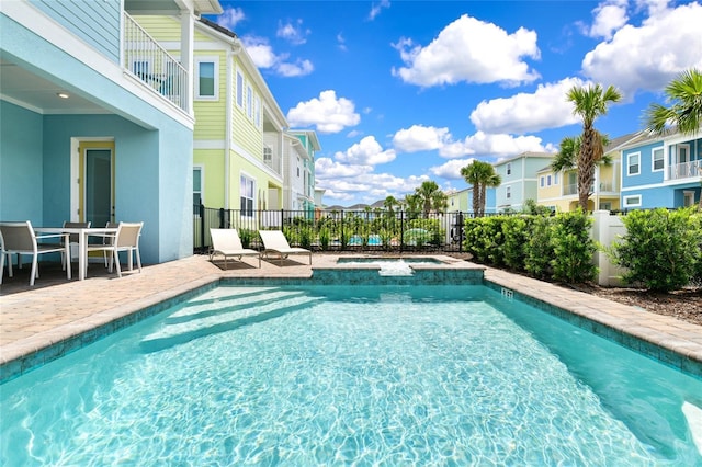 view of swimming pool with a patio area