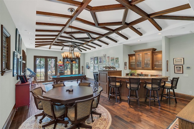 dining room with french doors, an inviting chandelier, vaulted ceiling with beams, dark hardwood / wood-style floors, and billiards