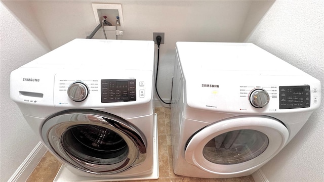 laundry area featuring washer and clothes dryer