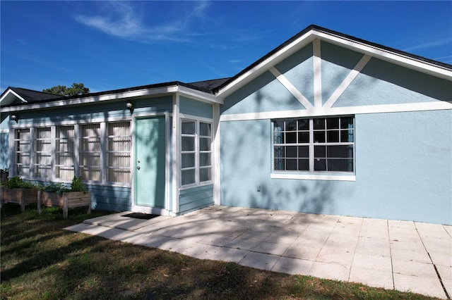 exterior space with a patio