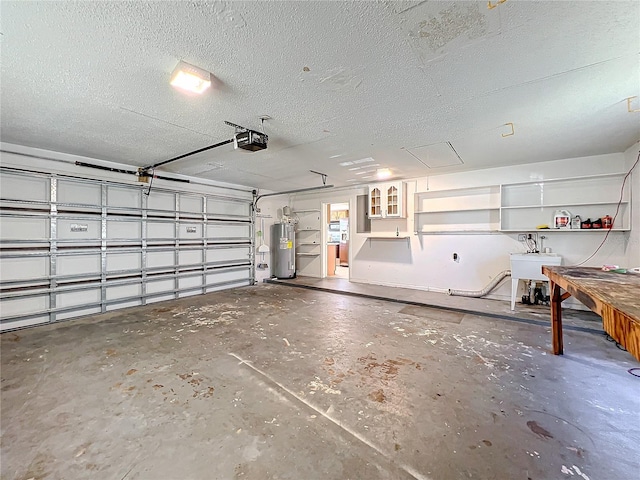 garage with water heater, sink, and a garage door opener