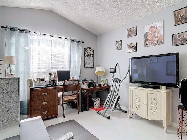 office area with lofted ceiling and a textured ceiling