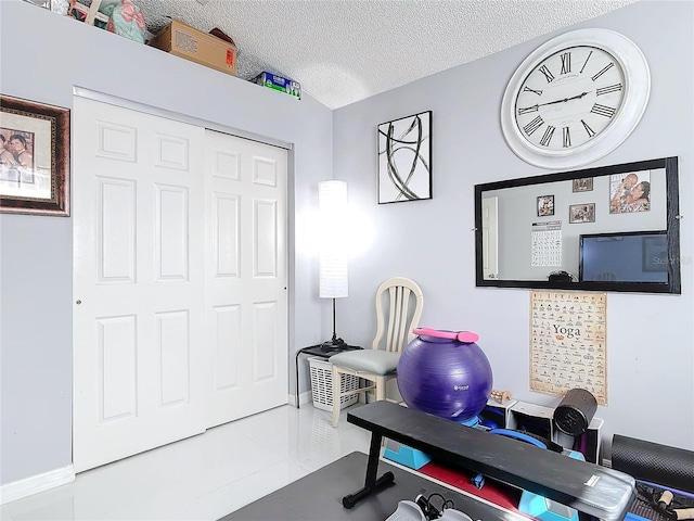 office area with a textured ceiling