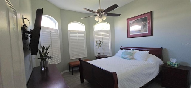 bedroom featuring ceiling fan and vaulted ceiling