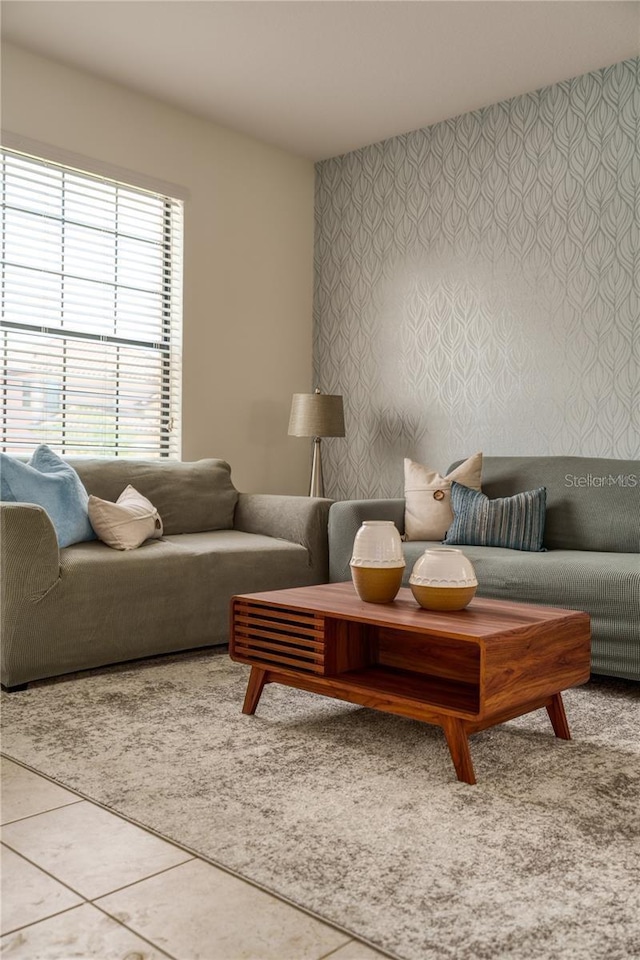 living room with tile patterned flooring