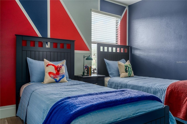 bedroom featuring hardwood / wood-style flooring