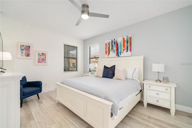 bedroom with light wood-type flooring and ceiling fan