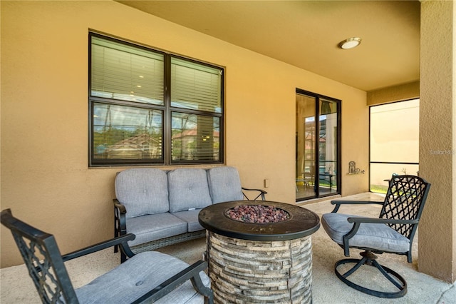 view of patio featuring a fire pit