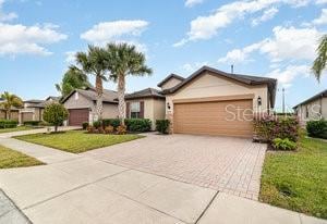 ranch-style house with a front lawn