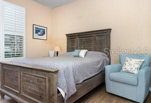 bedroom featuring wood-type flooring