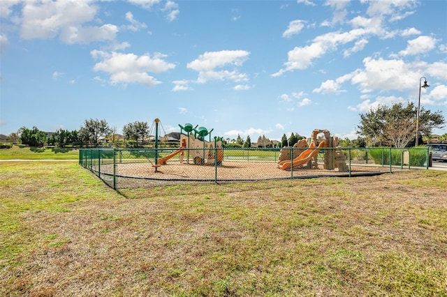 view of play area with a yard