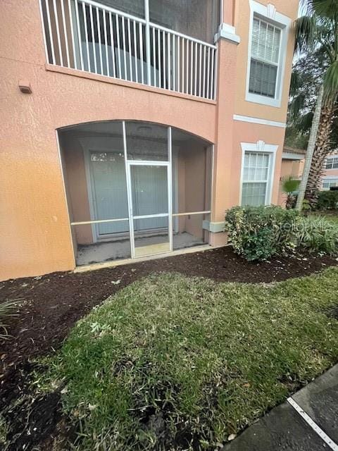 doorway to property with a balcony