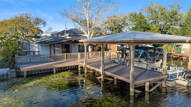 view of dock with a water view