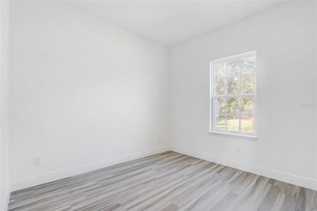 unfurnished room featuring light hardwood / wood-style floors