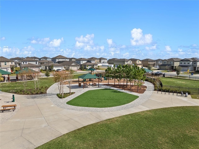 view of home's community with a gazebo and a lawn