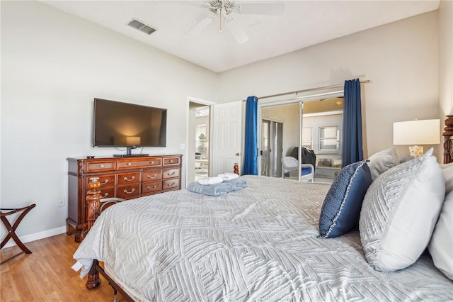 bedroom featuring ceiling fan and light hardwood / wood-style flooring