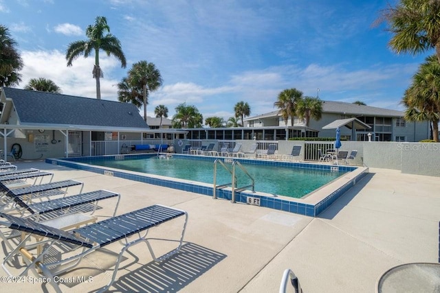 view of swimming pool featuring a patio