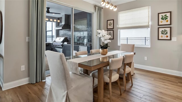 dining room featuring ceiling fan and light hardwood / wood-style flooring