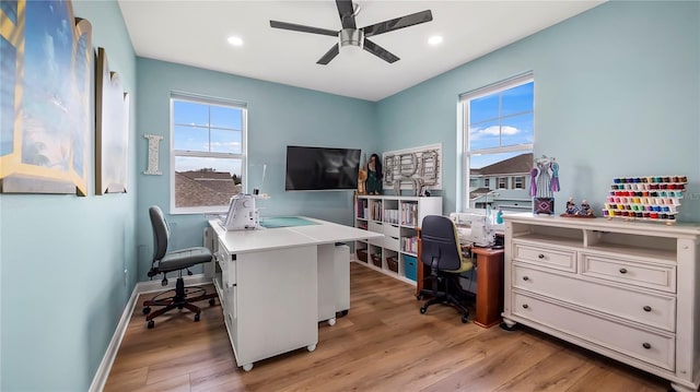 office area featuring light wood-type flooring and ceiling fan