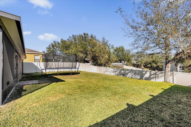 view of yard featuring a trampoline