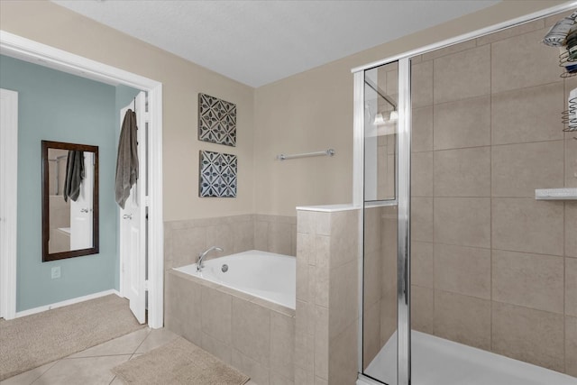 bathroom with tile patterned flooring and plus walk in shower