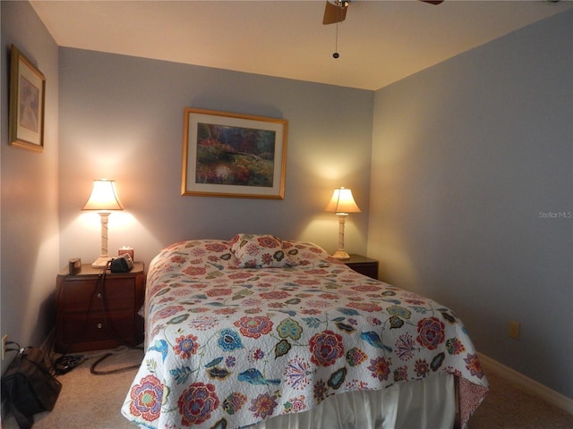 bedroom with carpet flooring and ceiling fan