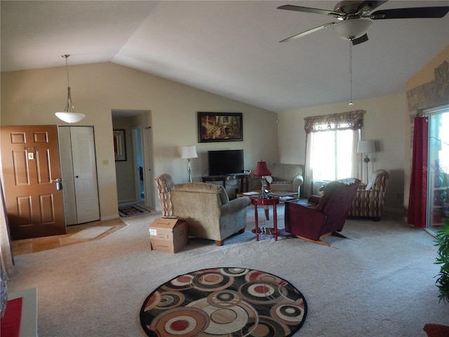 living room featuring ceiling fan, light colored carpet, and lofted ceiling