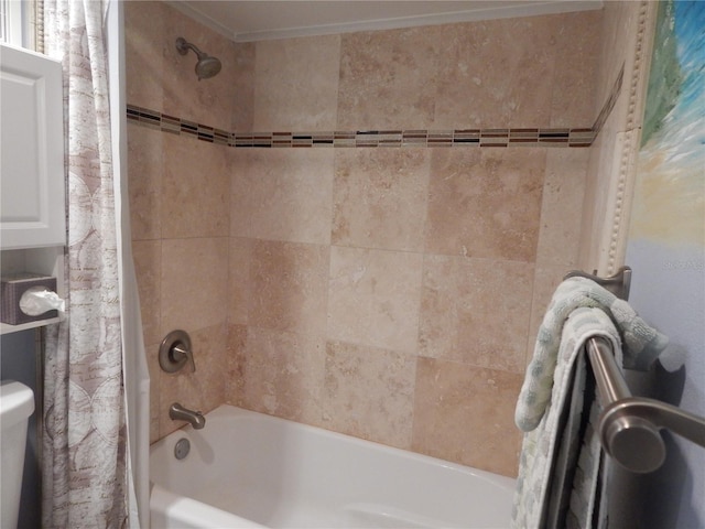 bathroom with shower / bath combo with shower curtain