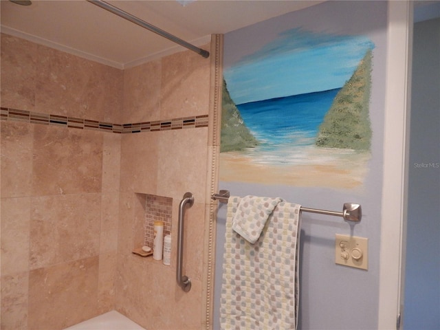 bathroom featuring a tile shower