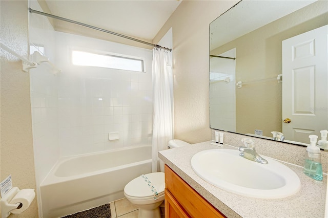 full bathroom featuring toilet, tile patterned flooring, vanity, and shower / bath combo with shower curtain