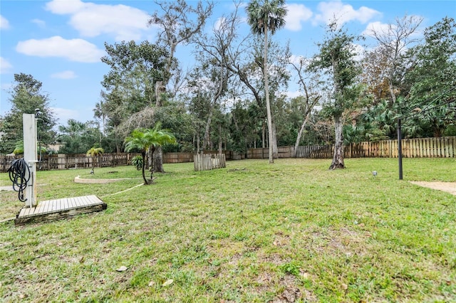 view of yard with a deck