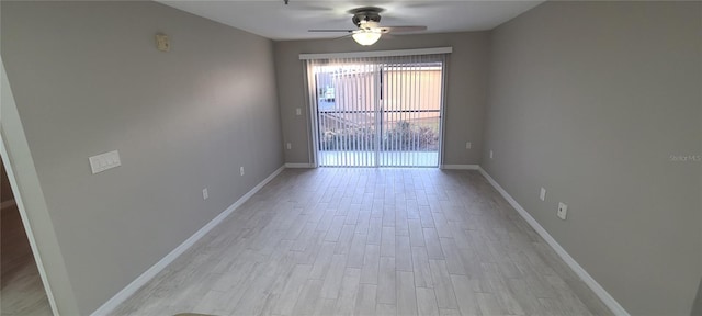 empty room with light hardwood / wood-style flooring and ceiling fan