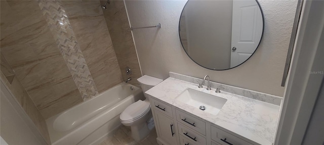 full bathroom featuring tiled shower / bath combo, vanity, and toilet