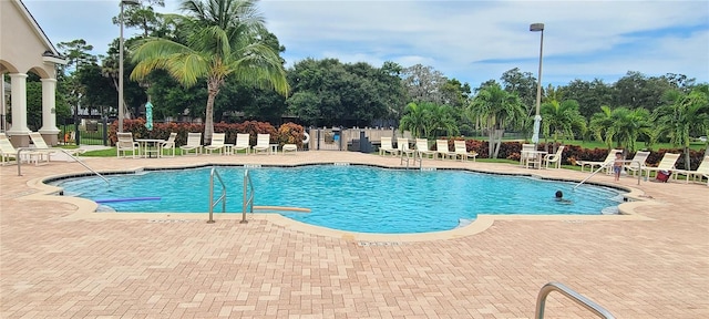 view of swimming pool featuring a patio