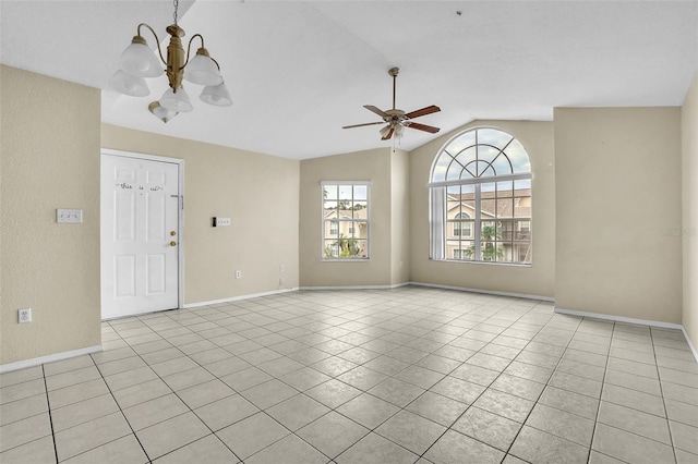 interior space featuring lofted ceiling and ceiling fan with notable chandelier