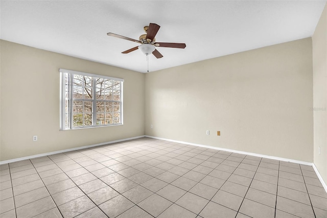 unfurnished room featuring ceiling fan and light tile patterned flooring