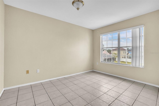 view of tiled spare room