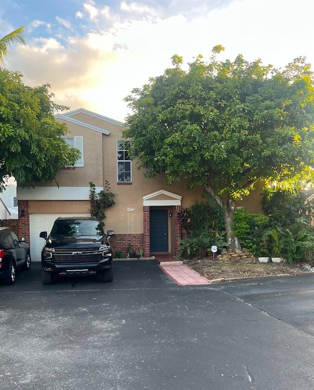 view of front of property featuring a garage