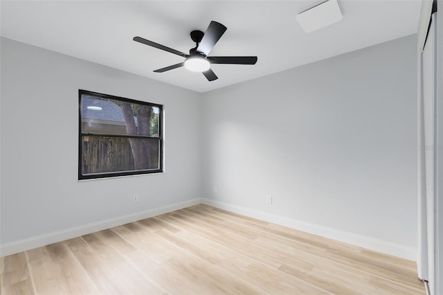 empty room featuring light hardwood / wood-style floors and ceiling fan