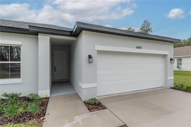 view of front of home featuring stucco siding