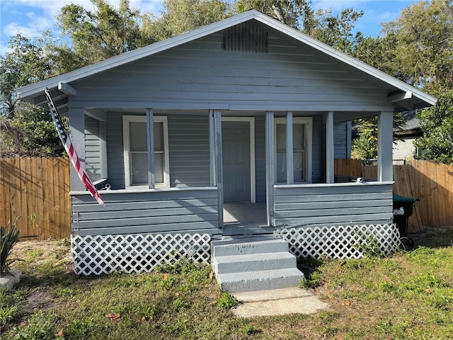 bungalow-style home with a porch