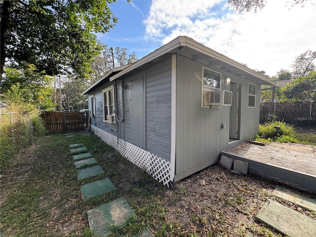 view of property exterior with cooling unit