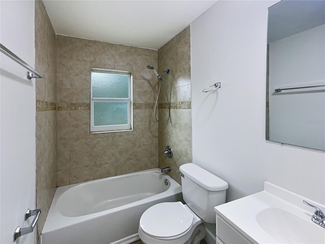 full bathroom with vanity, toilet, and tiled shower / bath