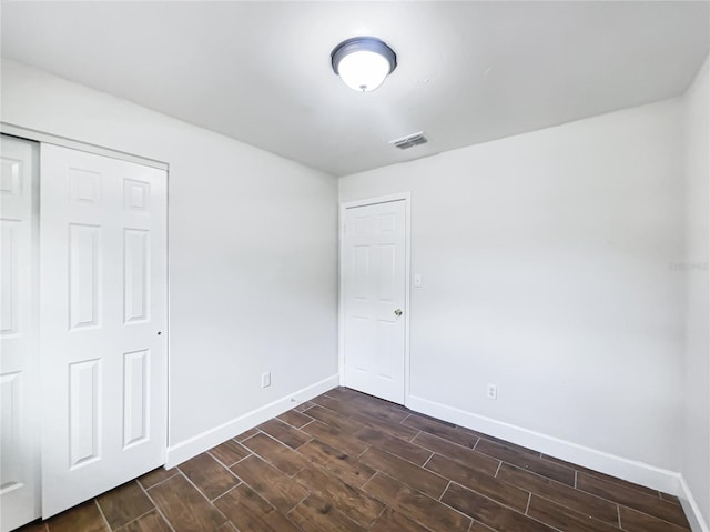 unfurnished bedroom featuring a closet